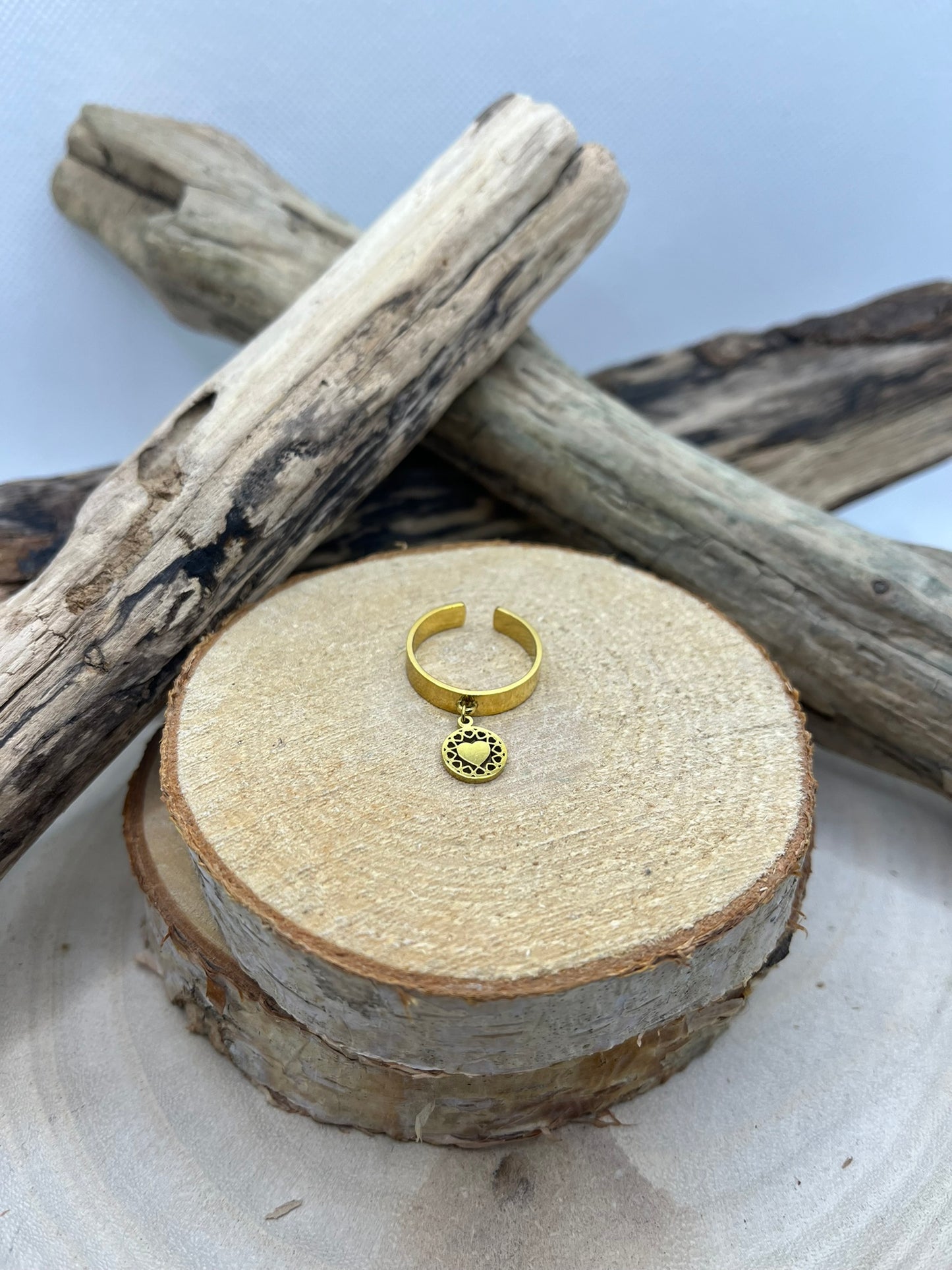 Bague acier inoxydable doré breloque avec une petit coeur et ajustable