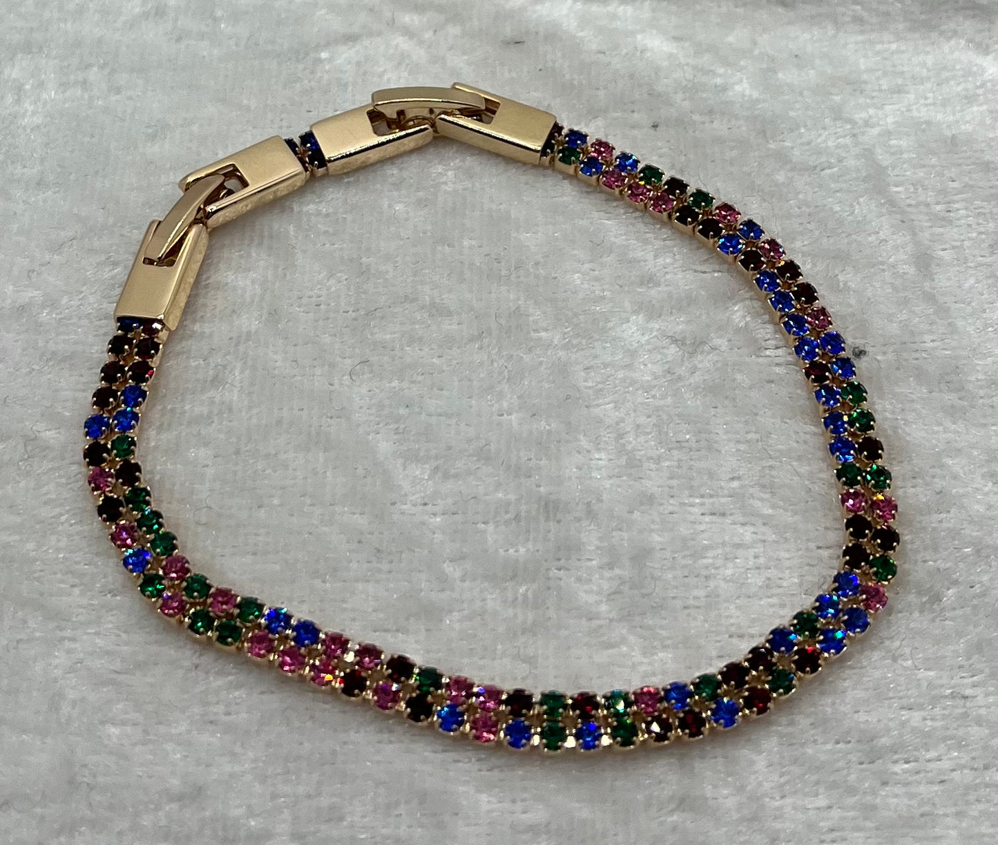 Bracelet élégant Femme Avec ces petits strass  de couleurs brillant - Acier inoxydable - Doré