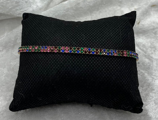 Bracelet élégant Femme Avec ces petits strass  de couleurs brillant - Acier inoxydable - Doré