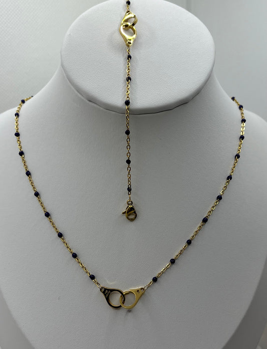 Ensemble Bijoux Femme Collier + Bracelet Chaine fine orné de petites perles bleu et d'un pendentif menotte - Acier inoxydable - Doré