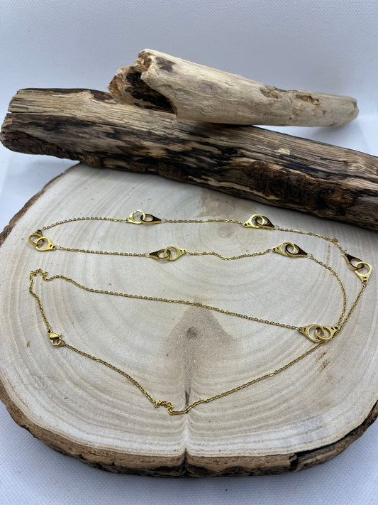 Collier Femme Chaine fine avec des anneaux croisés - Acier Inoxydable - Doré
