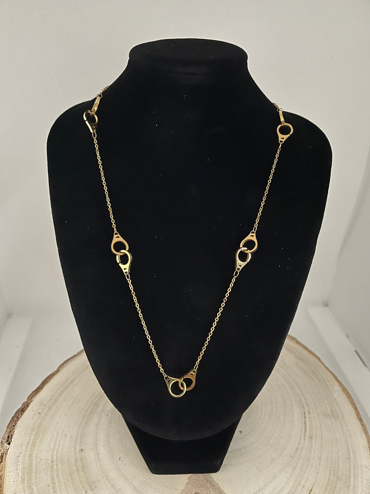 Collier Femme Chaine fine avec des anneaux croisés - Acier Inoxydable - Doré